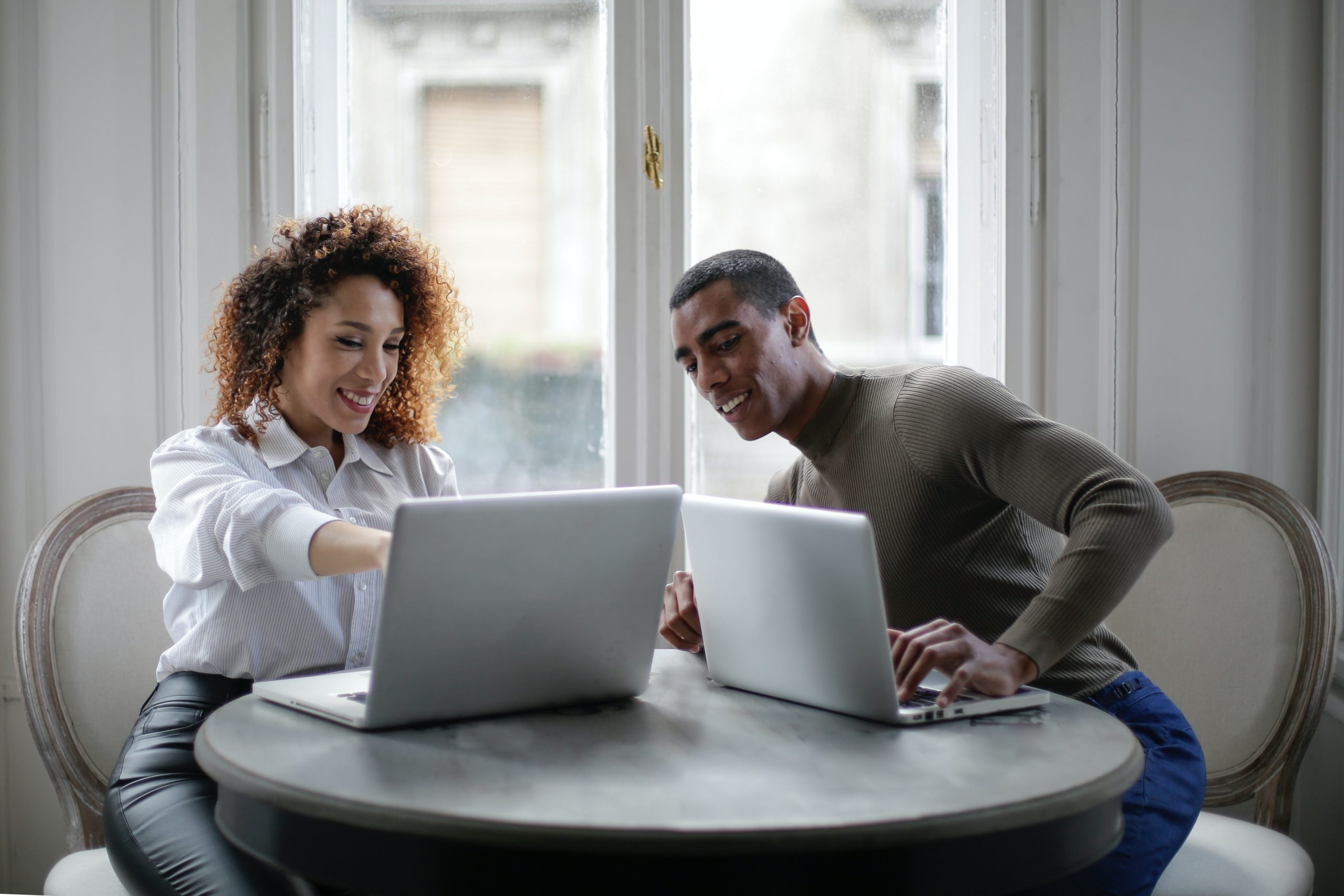 Couple with laptops